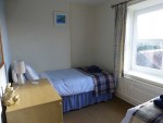 twin-bedroom-inside-blacksmiths-cottage